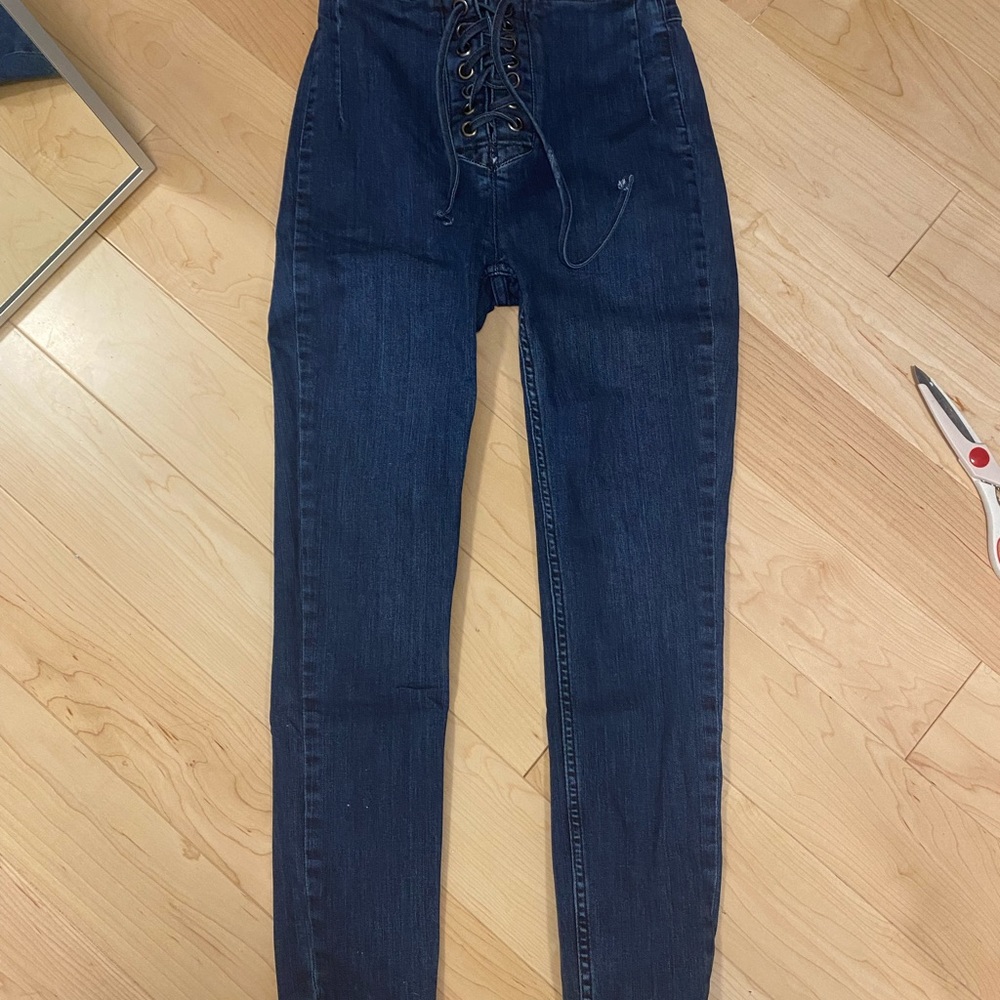 Free people jeans with tie detail